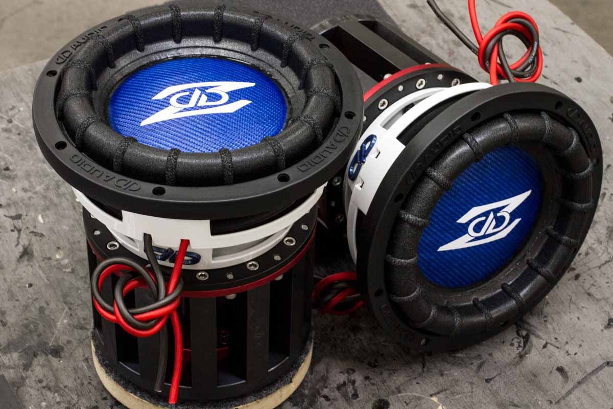 Two USA Made Subwoofers with white powder coat baskets, electric blue dust caps and white DD Z logos